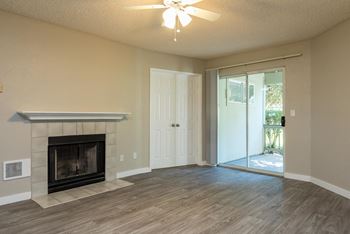 Three bedroom | living room with fireplace